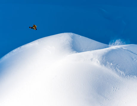 Travis Rice snowboarding on his Lib Tech Gold Member Snowboard