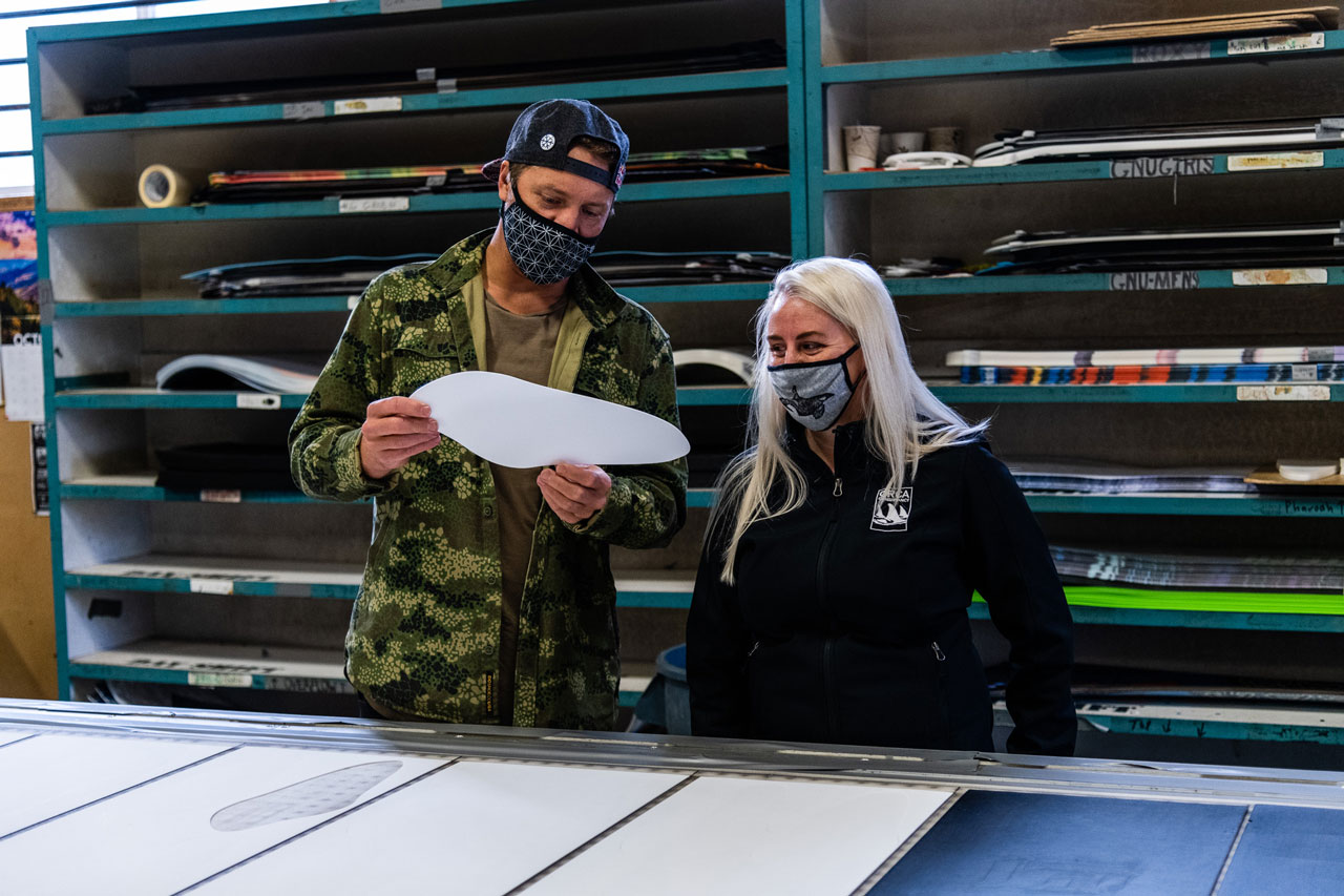 Travis and Orca Conservancies Tamara Kelley with the K-12 "Sequim" eye patch base logo named after the town Mervin MFG is located in.