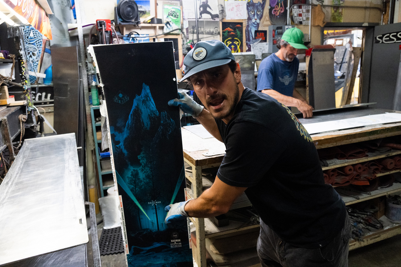 Chris Rasman building snowboard at Mervin Mfg